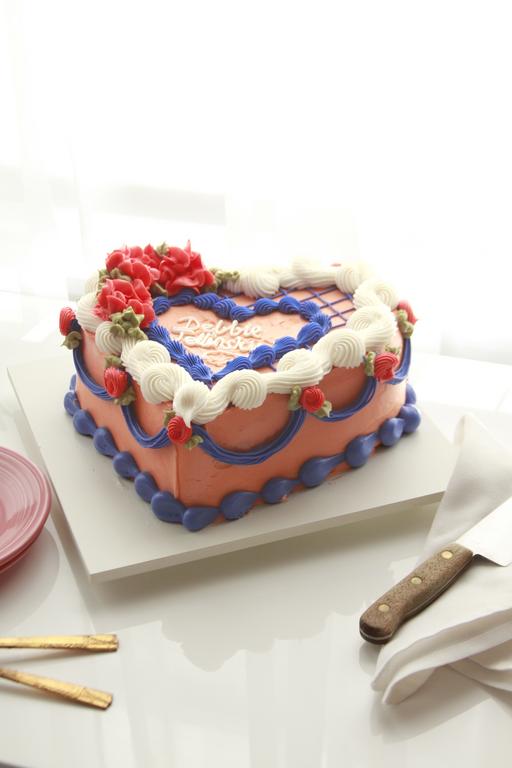 Close view of buttercream ruffles on Black Widow Cake