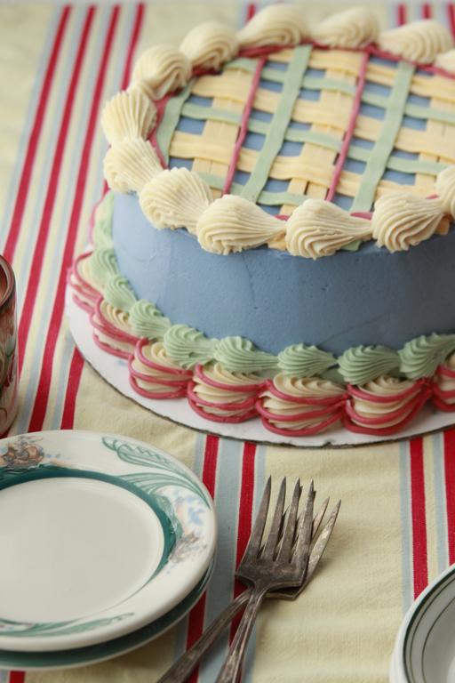 Side view of New England Apple Cake on striped cloth