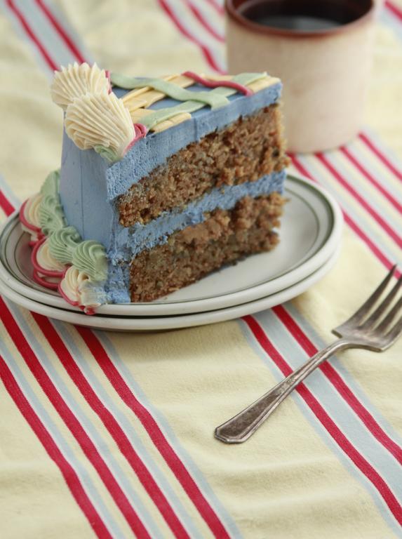 Slice of New England Apple Cake showing apple layers