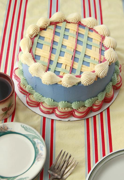 New England Apple Cake with buttercream lattice on top